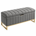 Banc coffre 120 cm en velours gris avec rangement et piètement doré